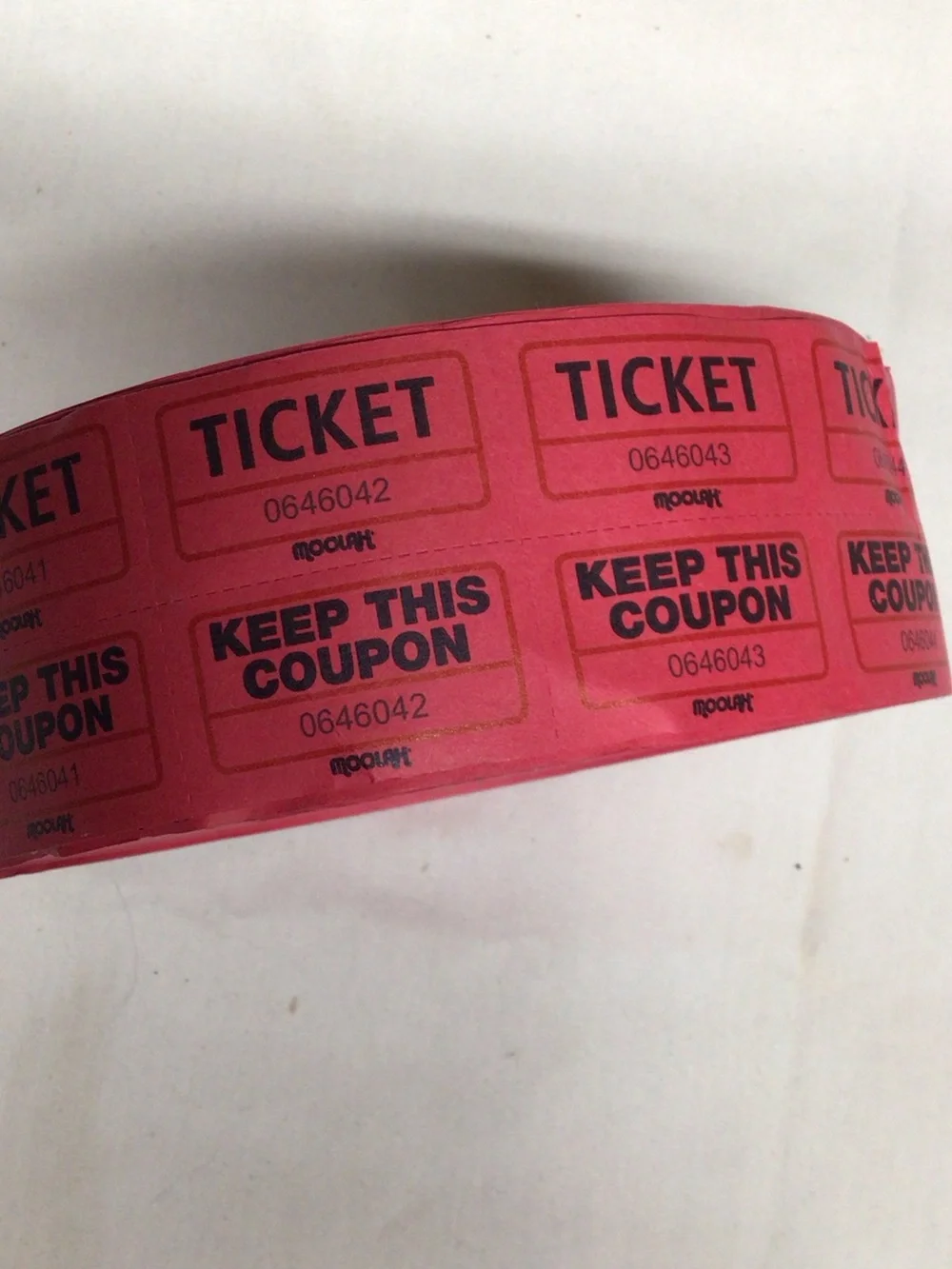 Source Unknown Red Raffle Ticket Roll with Black Print